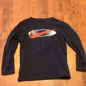 Nike Kids Long Sleeve Tee in black with orange swoosh